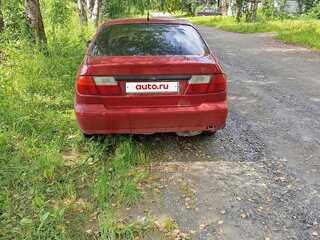 1998 Nissan Primera II (P11), красный, 135000 рублей, вид 3