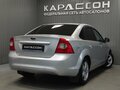 2010 Ford Focus II Рестайлинг, серебристый, 475000 рублей - вид 1