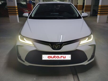 2021 Toyota Corolla XII (E210), белый, 1780000 рублей, вид 2