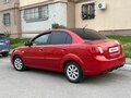 2010 Kia Rio II Рестайлинг, красный, 470000 рублей - вид 2