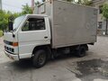 1988 Isuzu Elf (N-series), белый, 450000 рублей - вид 2