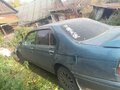 1997 Nissan Bluebird SR18 XI (U14), синий - вид 2