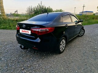 2011 Kia Rio III, чёрный, 555000 рублей, вид 2