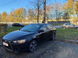 2011 Mitsubishi Lancer X Рестайлинг, чёрный, 580000 рублей, вид 1