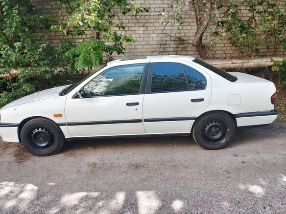 1991 Nissan Primera I (P10), белый, 110000 рублей - вид 1