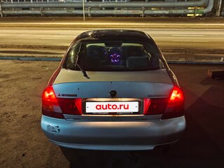 1996 Mitsubishi Carisma I, пурпурный, 145000 рублей, вид 2