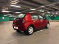 2014 Renault Sandero I, красный - вид 3