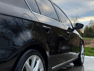 2011 Volkswagen Passat B7, чёрный, 1590000 рублей, вид 4