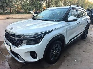 2023 Kia Seltos I Рестайлинг, белый, 1900004 рублей, вид 1