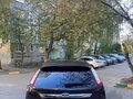 2009 Ford Focus II Рестайлинг, фиолетовый - вид 6