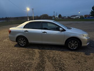 2008 Toyota Corolla Axio X (E140, E150), серебристый, 680000 рублей, вид 2
