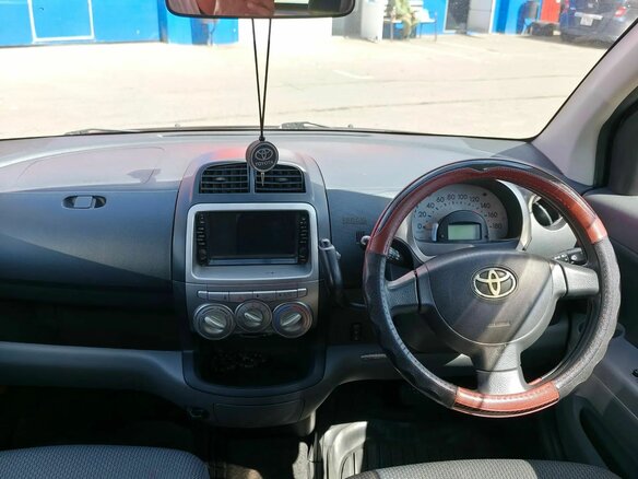 2009 Toyota Passo I (C10), красный - вид 5