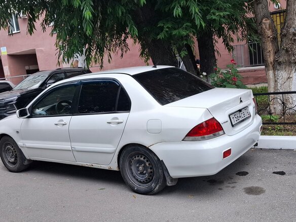 2006 Mitsubishi Lancer IX, белый, 310000 рублей - вид 9