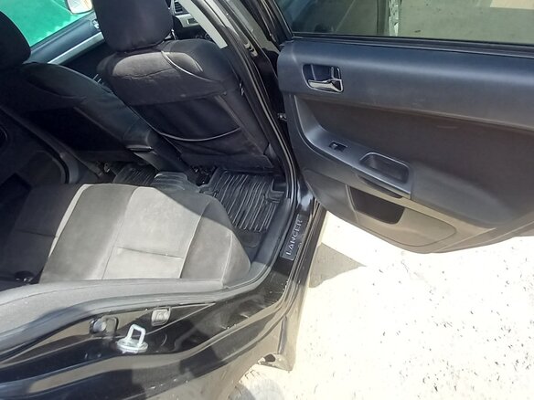 2007 Mitsubishi Lancer X, чёрный, 650000 рублей - вид 8