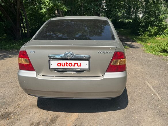 2001 Toyota Corolla IX (E120, E130), золотистый, 500000 рублей - вид 2