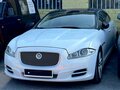 2010 Jaguar XJ Long IV (X351), коричневый - вид 1
