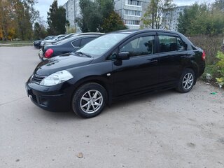 2010 Nissan Tiida I Рестайлинг, чёрный, 900000 рублей, вид 1