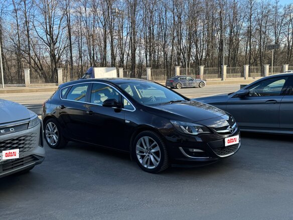 2014 Opel Astra J Рестайлинг, коричневый, 1360000 рублей - вид 5