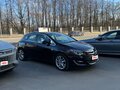 2014 Opel Astra J Рестайлинг, коричневый, 1360000 рублей - вид 5