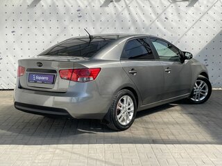2012 Kia Cerato 6-speed II, серебристый, 820000 рублей, вид 5