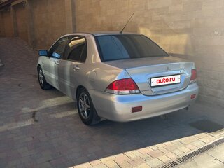 2009 Mitsubishi Lancer Classic IX Рестайлинг, серебристый, 469000 рублей, вид 1