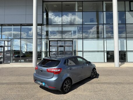 2012 Kia Rio 4-speed III, голубой, 795000 рублей, вид 5
