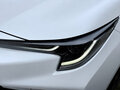 2022 Toyota Corolla Sporty XII (E210) Рестайлинг, белый - вид 2