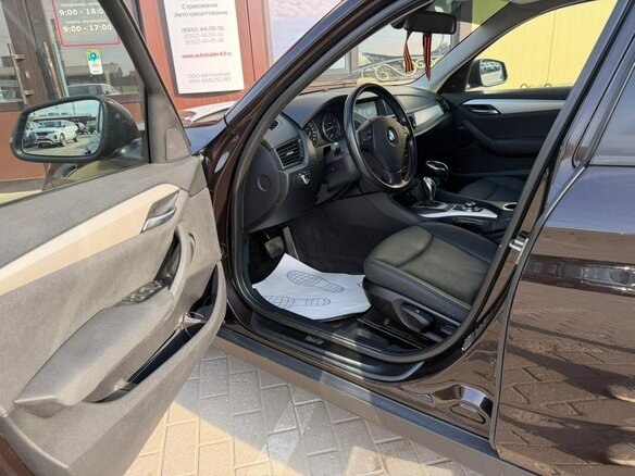 2014 BMW X1 20i I (E84) Рестайлинг, коричневый, 1480000 рублей - вид 13
