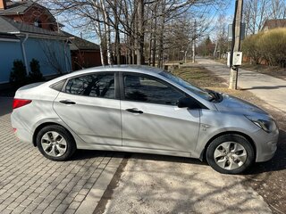 2014 Hyundai Solaris I Рестайлинг, серебристый, 950000 рублей, вид 4