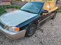 2003 Kia Magentis I Рестайлинг, чёрный, 130000 рублей