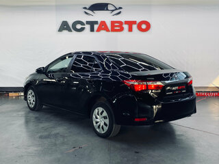 2014 Toyota Corolla XI (E160, E170, E180), чёрный, 1170000 рублей, вид 4