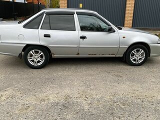 2010 Daewoo Nexia I Рестайлинг, серебристый, 230000 рублей, вид 3