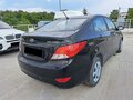 2014 Hyundai Solaris I, чёрный, 630000 рублей - вид 2