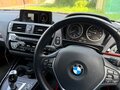 2016 BMW 1 серии 118i II (F20/F21) Рестайлинг, чёрный, 1599000 рублей - вид 11