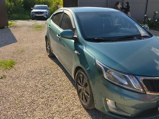 2011 Kia Rio III, зелёный, 580000 рублей, вид 4