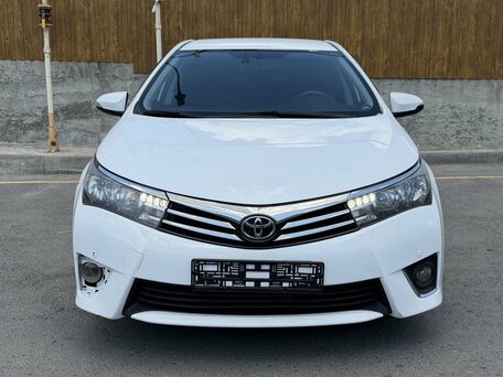 2014 Toyota Corolla XI (E160, E170, E180), белый, 1100000 рублей, вид 2