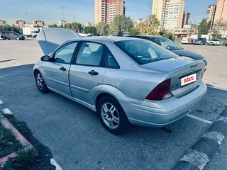 2001 Ford Focus I (North America), серебристый, 190000 рублей, вид 5