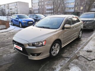 2008 Mitsubishi Lancer X, золотистый, 900000 рублей, вид 1