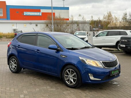 2013 Kia Rio 4-speed III, синий, 965000 рублей, вид 3