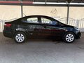 2014 Kia Rio III, чёрный - вид 5