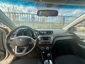 2013 Kia Rio 4-speed III, бежевый, 820000 рублей - вид 6