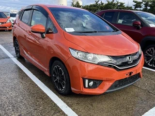 2015 Honda Fit III, оранжевый, 1300000 рублей, вид 3