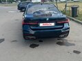 2014 BMW 7 серии 750i xDrive V (F01/F02/F04) Рестайлинг, синий, 2300000 рублей - вид 3