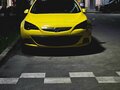 2013 Opel Astra GTC J Рестайлинг, жёлтый, 1070000 рублей - вид 4