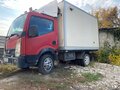 2010 Nissan Cabstar, красный, 740000 рублей - вид 1