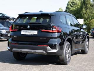 2026 BMW X1 18i sDrive III (U11/U12), чёрный, 5213881 рублей, вид 4
