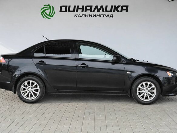 2012 Mitsubishi Lancer X Рестайлинг, чёрный, 790000 рублей - вид 5