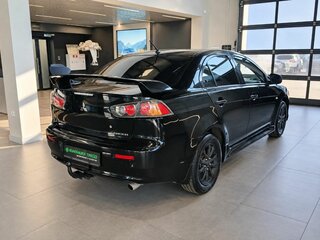 2010 Mitsubishi Lancer X, чёрный, 730000 рублей, вид 4