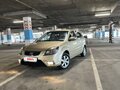 2010 Kia Rio II Рестайлинг, золотистый, 595000 рублей - вид 1