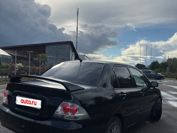 2009 Mitsubishi Lancer Classic IX Рестайлинг, чёрный, 330000 рублей - вид 5